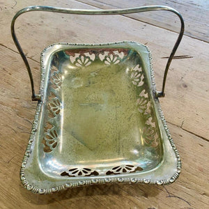 Silver Dish with foldable handle and delicate flower detail